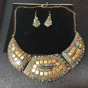 Gold tone earrings and necklace set.